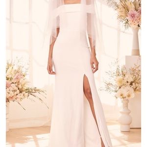 Floor length dress with slit could be used for a bride.
